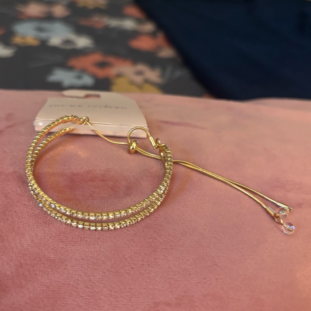 NWT “You're Invited” Gold Tone Simulated Stone Adjustable Bracelet
